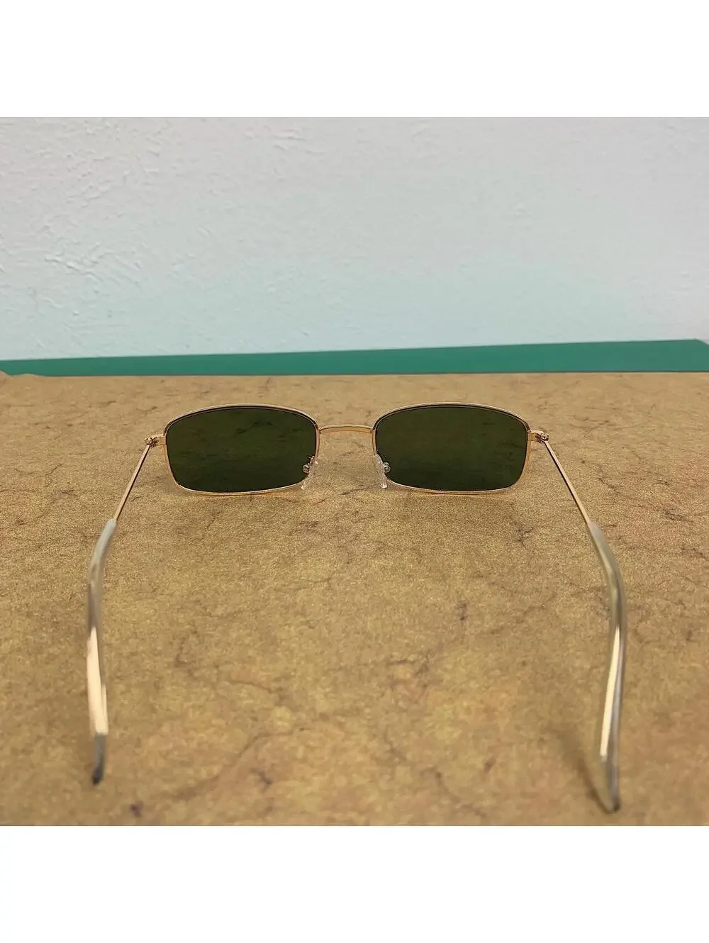 Y2k 2000s vintage green and gold unique slim style sunglasses. Gold trim with